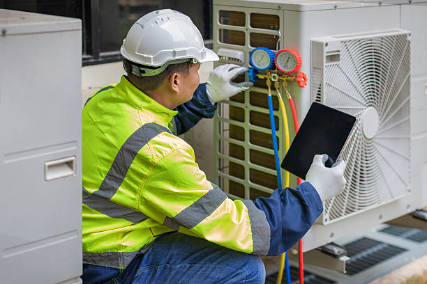 Professional Air Duct Cleaning technician working in Tuskegee Institute, AL